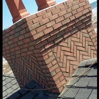 A finished chimney on a residential building.